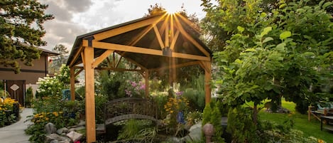 New Gazebo over the pond beside sitting area, stunning.