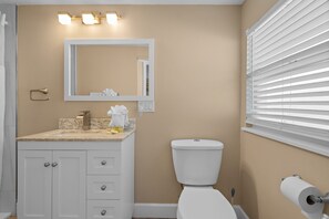 Master bath, complimentary travel size soaps and bath towels provided