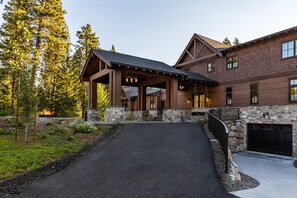 Driveway to the porte-cochere or to garage parking for at least 4 vehicles.