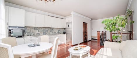 Living room, kitchen and dining area