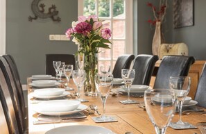 Ground floor: The elegant dining table seating twelve guests