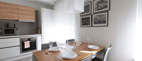 Dining area for up to 5 persons with fully equipped kitchen