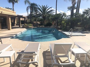 Pool view of Four Peaks Mountain, waterfall feature