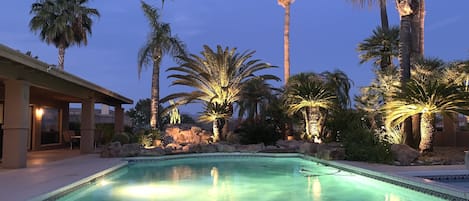 Private Pool featuring landscape lighting