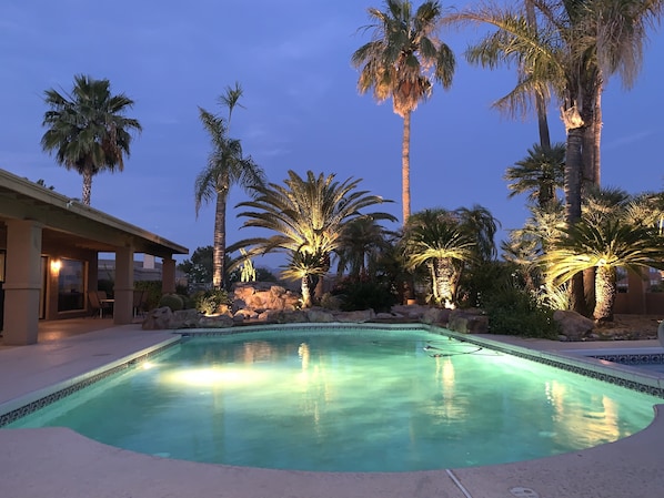 Private Pool featuring landscape lighting