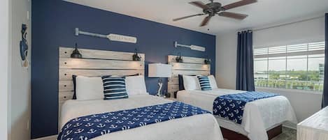 Back bedroom (2 queen beds) overlooks the Intracoastal, flat screen TV and attached bathroom.