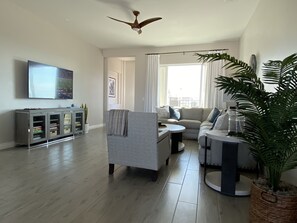 Family room with books/game cabinet