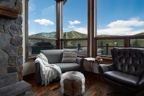 Cozy seating in the main level living room with sweeping views