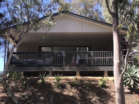 Lovely undercover verandah at the front of the property with rural views