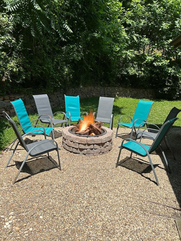 Enjoy the fire pit in the back yard