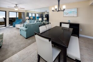 Dining area - The tiled dining area flows smoothly into the homey carpeted living room.