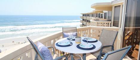 Gather around the patio table and watch as the tide rolls in