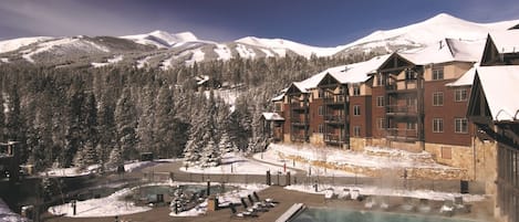View of outdoor pool and hot tubs.  On-site ski rentals available.  Ski in/out!