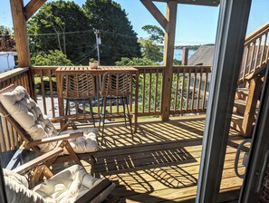 The deck with high top table and comfortable seating