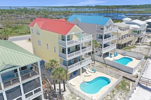 Beachfront Home with Pool and Bay in Background