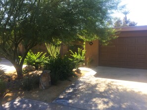 Entrance pathway, garage & driveway
