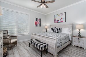 Master Bedroom with King Bed. Large closets, dresser, and night stands.