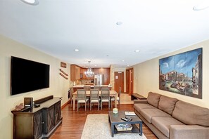 Spacious living room with large smart TV