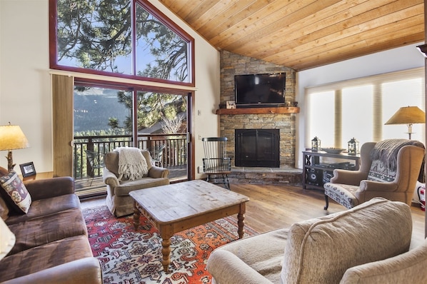 Spacious living room with spectacular views and a gas fireplace