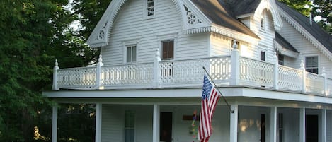 Carpenter Gothic style architecture...horseshoe gingerbread trim