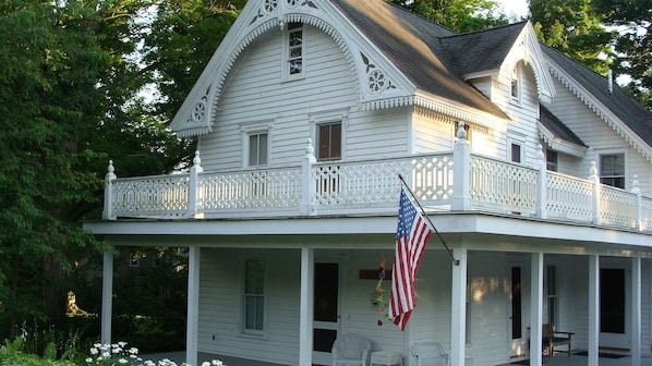 Carpenter Gothic style architecture...horseshoe gingerbread trim