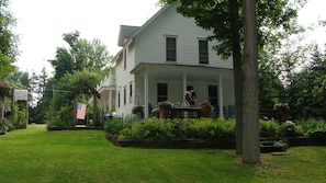 Lake side of house looking at Deck and wraparound garden