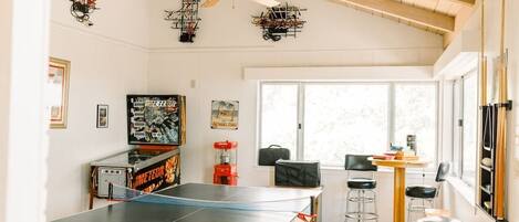 Game Room - View 1 (Ping Pong/Pool Table, pinball machine, popcorn machine)