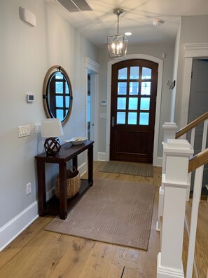 Front entry. Queen bedroom on the left. Full bath on the right.