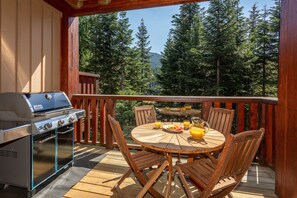 Deck off the kitchen looks over Whistler Mountain