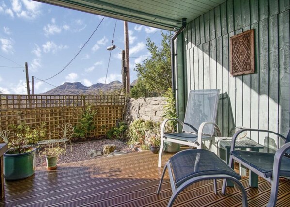 Under cover sun patio an unusual feature you can sit outside when it rains! 