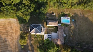 A drone shot of the whole property. The gite and pool are on the right hand side