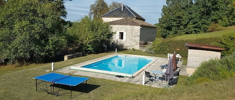 View of the gite from the pool and garden area. 