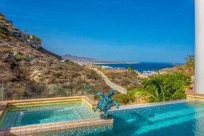 Enjoy the view of the Marina from the pool.