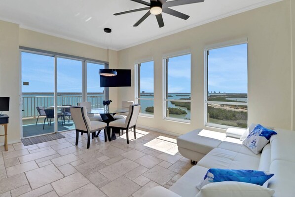 This gorgeous penthouse condo enjoys stunning top floor views of the Estero Bay as far as the eye can see.