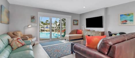 The beautifully remodeled duplex offers a perfect Florida vacation and this unit enjoys the private use of the heated pool.