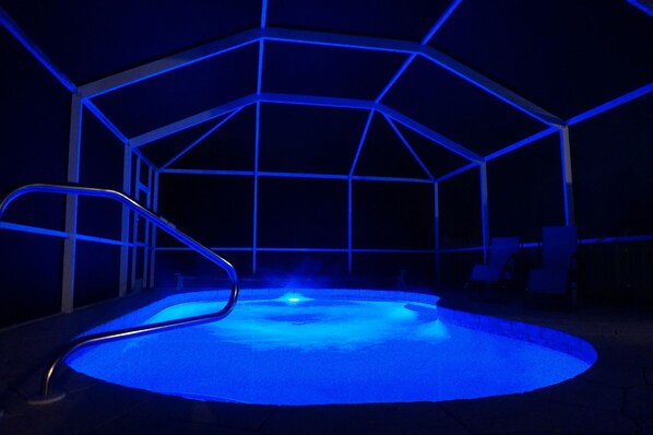 Heated salt water pool with blue night light