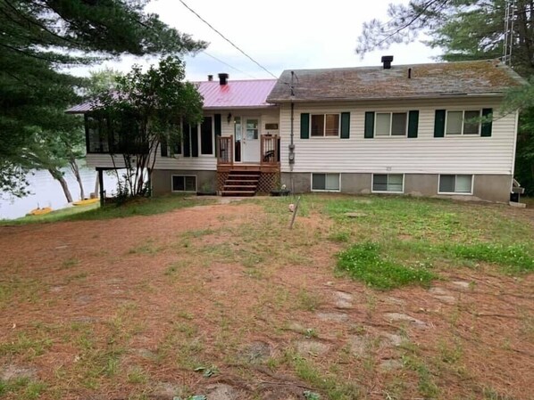 Cottage Front View with 8-10 car parking. 