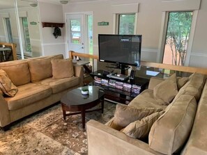 Top Floor - Front entrance /  family room, wood oven, large window, lakeview