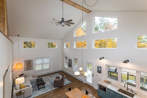 Vaulted ceilings and big windows give the space an open, airy feeling