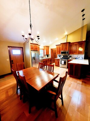 Dining table expands to seat more family.  Extra chairs in the master closet. 