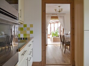 Well-equipped fitted kitchen | Rowan Cottage, Aviemore