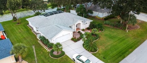  HOME WITH POOL AND BACKYARD CANAL. NOTE THE POOL CAGE HAS NOT YET BEEN REPLACED