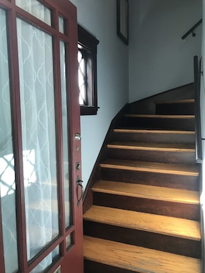 You must climb these stairs to gain access to the 2nd floor apartment.