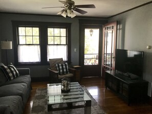 TV room opens onto the front porch. There is a wonderful cross breeze.