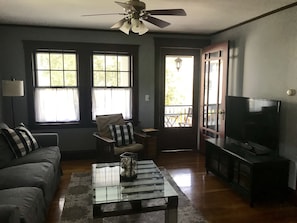 TV room opens onto the front porch. There is a wonderful cross breeze.