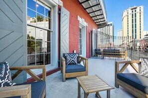 Extra deep balcony with cozy sectional and coffee table. Perfect for morning and evening relaxing!