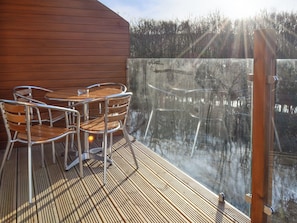 Decked patio with outdoor furniture | Waterside Lodge Sixteen - Ashgrove Country Park, Elland