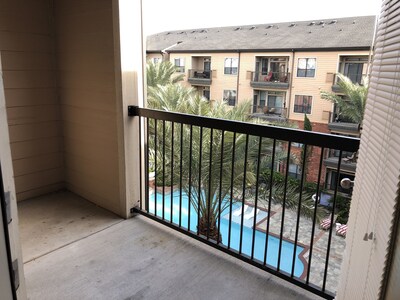 Peaceful Poolview Large 2 BE/2 BA Apt. In the Greater Heights Area.