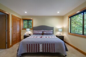 Master loft bedroom has a king size bed and private bath
