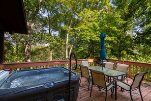 Hot tub,  Dinette table and gas grill  on the open deck